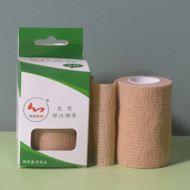 Self-adhesive compression bandage