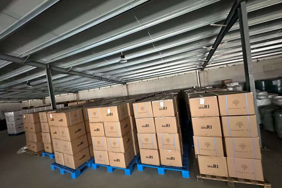 Wooden crates and cartons on pallets ready to load